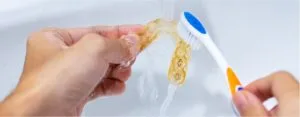 Rinse-mouth-guard-with-cool-water-300x117.webp