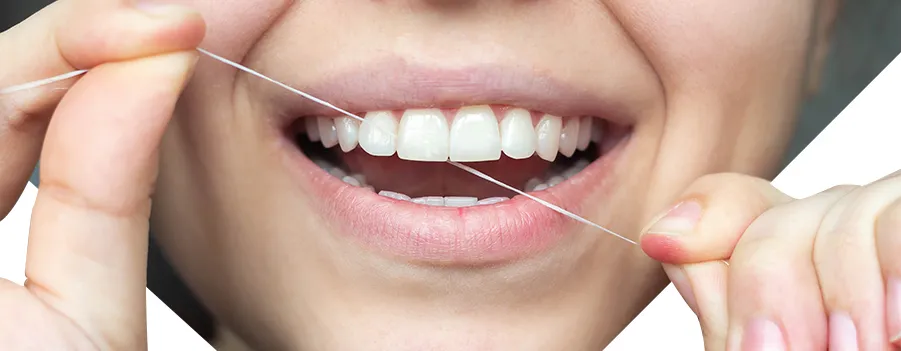 brush-and-floss-your-teeth-to-remove-tartar.webp